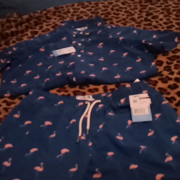 Bernie's set one Bernie's shirt size small and one size medium trunks